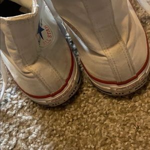 Converse white high tops
